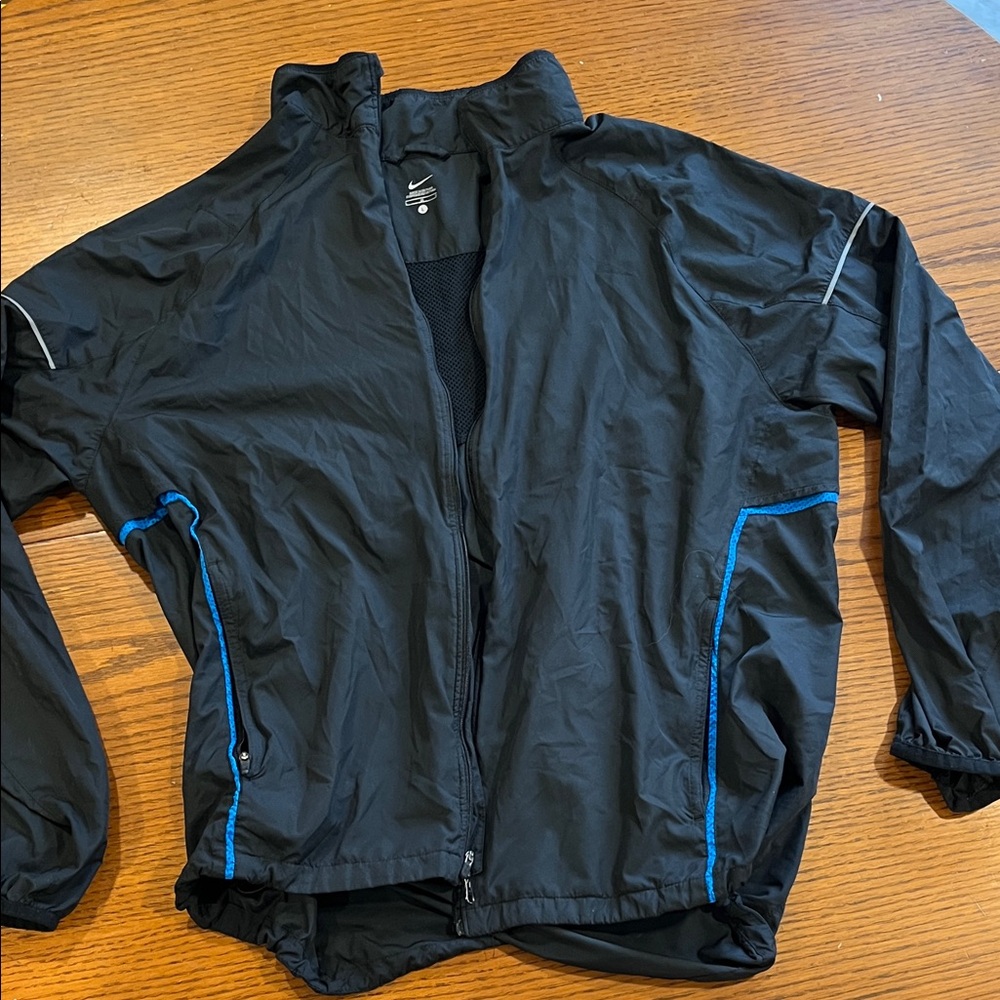 Nike Men's Black Windbreaker with Blue Accents